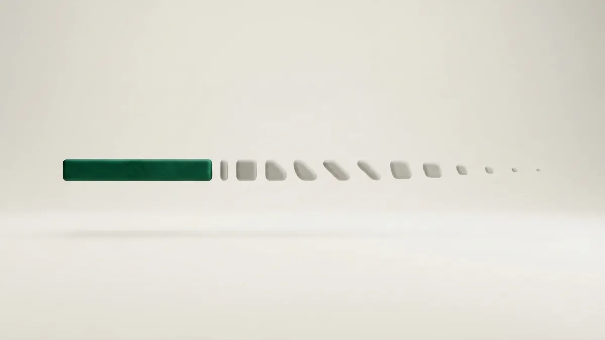 A short solid green clay bar followed by grey pieces that get smaller and further apart until they fade out